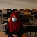 Mahasiswi duduk di kelas saat pembukaan kembali kampus di Afghanistan yang diduduki Taliban. (AFP)