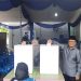 Dr. Maulana dan Istri Menyalurkan Hak Pilih di TPS 01 Kebun Handil