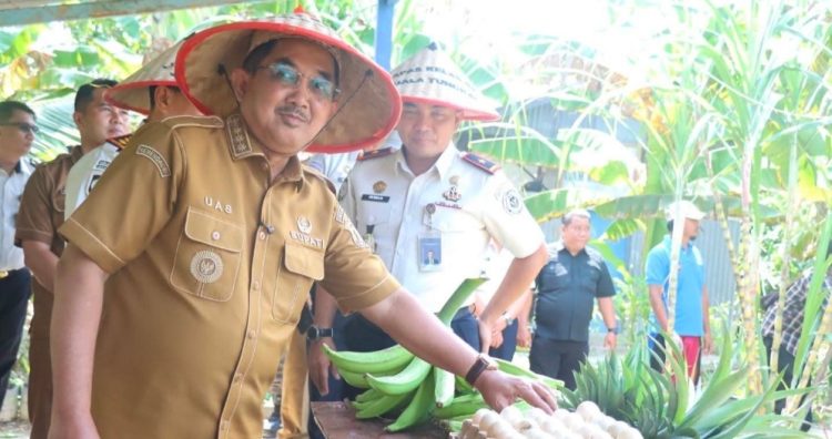 Bupati Anwar Sadat Serahkan Kunci Bedah Rumah, Tinjau Panen Raya Bersama Warga Binaan Lapas